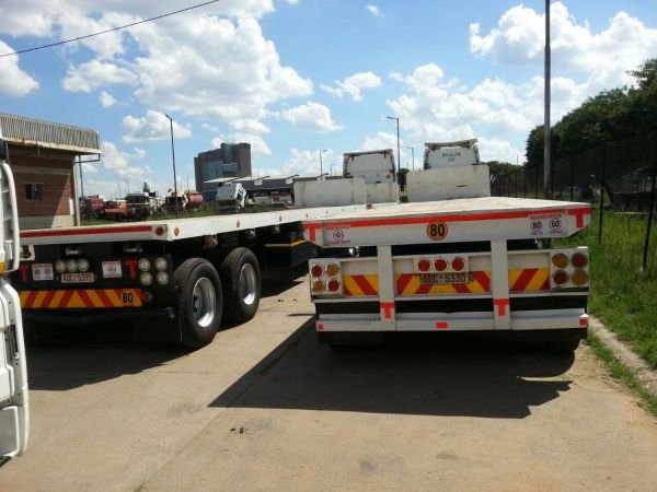 Tri-axle flat deck trailer for sale